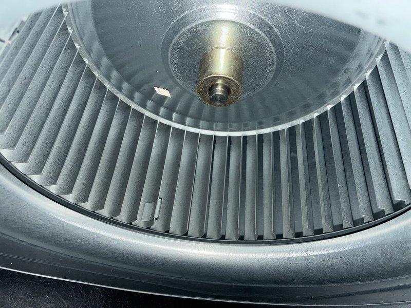 Completed comprehensive preventive maintenance on 5-year-old air conditioning system. Inspected blower wheel assembly and found moderate dust accumulation on blades; cleaned and verified proper operation. Examined air filter and noted visible dust and debris buildup in pleated media; replaced filter to restore optimal airflow and system efficiency.