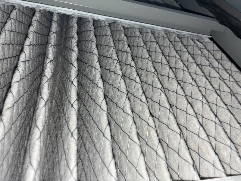 Completed comprehensive preventive maintenance on 5-year-old air conditioning system. Inspected blower wheel assembly and found moderate dust accumulation on blades; cleaned and verified proper operation. Examined air filter and noted visible dust and debris buildup in pleated media; replaced filter to restore optimal airflow and system efficiency.