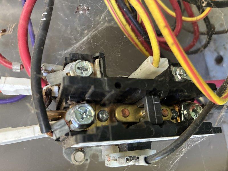 Completed MVP recurring cooling maintenance visit on HVAC system. Performed comprehensive inspection of electrical control components, including contactor assembly and electronic control board. Documented existing conditions showing age-related wear on contactor terminals with visible rust and corrosion on connection screws. Verified all wire connections secure across multi-conductor control wiring. Control board assembly and associated wiring harnesses confirmed operational with no immediate service requirements identified. System photographed for maintenance records.