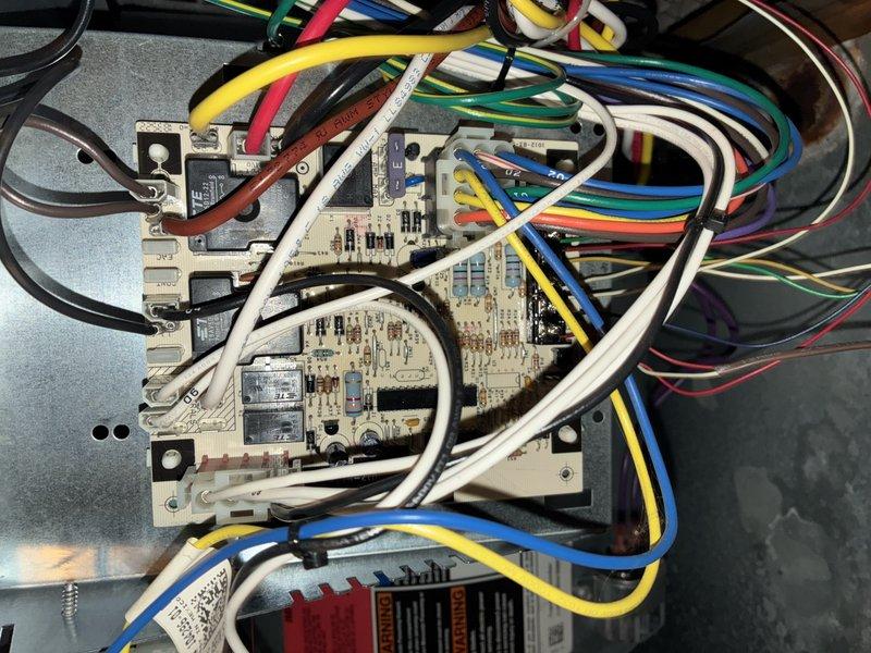 Completed MVP recurring cooling maintenance visit on HVAC system. Performed comprehensive inspection of electrical control components, including contactor assembly and electronic control board. Documented existing conditions showing age-related wear on contactor terminals with visible rust and corrosion on connection screws. Verified all wire connections secure across multi-conductor control wiring. Control board assembly and associated wiring harnesses confirmed operational with no immediate service requirements identified. System photographed for maintenance records.