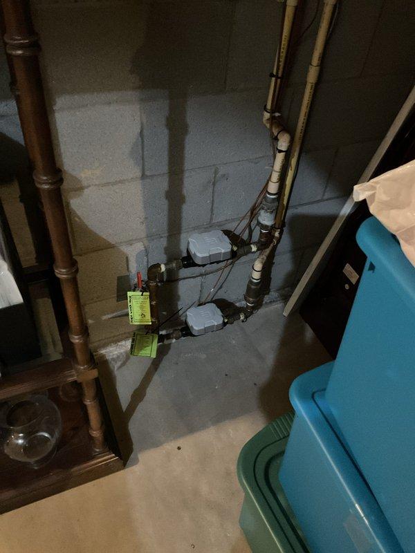 Replaced rear exterior hose bib assembly due to deteriorated fixture. Removed existing stop and waste valve and installed new ball valve for improved shutoff control. Rebuilt CPVC supply line from interior shutoff to exterior wall penetration with new fittings and connections. Installed new frost-free outdoor faucet with proper drainage capability. All connections tested and verified leak-free under full pressure.