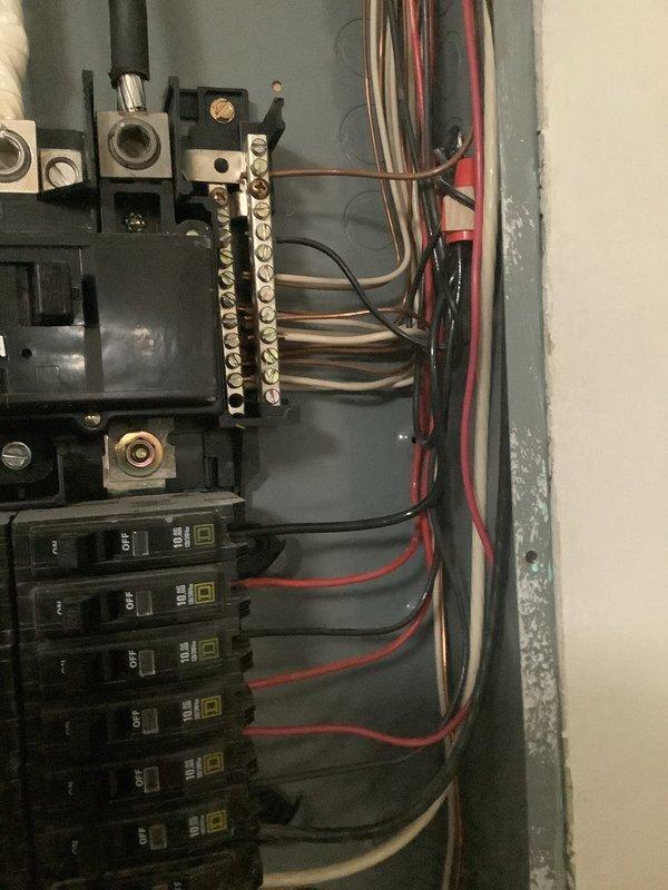 Responded to service call for electrical panel violations identified during home inspection prior to sale. Corrected double-tap condition on circuit breaker by properly separating circuits and installing additional breaker as needed to meet NEC requirements. Installed missing panel cover/deadfront to ensure proper enclosure of energized components and maintain safety standards. Verified all breaker connections were secure, properly torqued, and labeled. Confirmed panel door closes and latches correctly with all safety warnings visible. All work completed to code compliance for final inspection clearance.