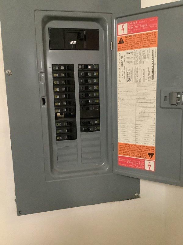 Responded to service call for electrical panel violations identified during home inspection prior to sale. Corrected double-tap condition on circuit breaker by properly separating circuits and installing additional breaker as needed to meet NEC requirements. Installed missing panel cover/deadfront to ensure proper enclosure of energized components and maintain safety standards. Verified all breaker connections were secure, properly torqued, and labeled. Confirmed panel door closes and latches correctly with all safety warnings visible. All work completed to code compliance for final inspection clearance.