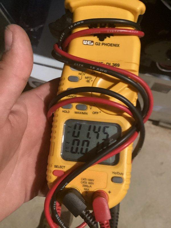 Completed MVP recurring cooling maintenance visit on Lennox HVAC system. Performed standard diagnostic checks including electrical measurements using digital clamp meter, verifying system amperage readings at 0.145A. Inspected air handler unit, condensate drain lines, PVC venting system, and humidifier attachment. All components found operating within normal parameters with proper drainage function confirmed.