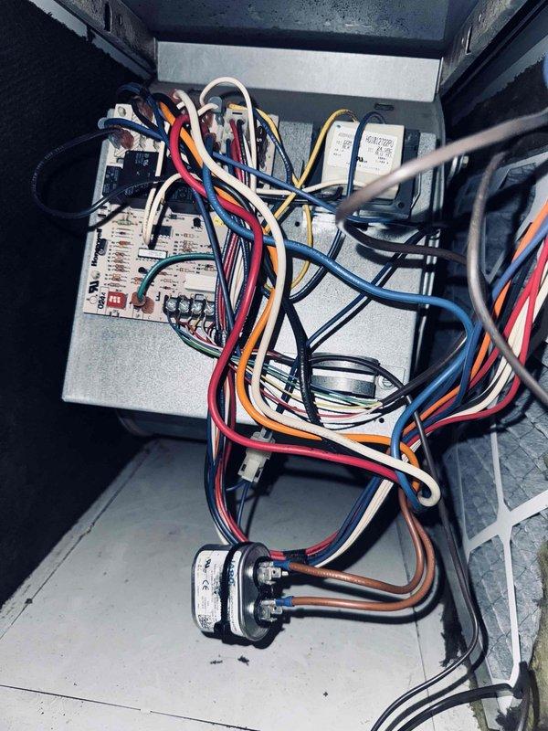 Completed comprehensive tune-up on 10-year-old residential air conditioning system. Performed full system inspection including control board examination, electrical connections verification, and temperature diagnostics. All control wiring, terminals, and electronic components inspected and found secure with proper connections maintained. System operating within normal temperature parameters at 52°F. Unit tested and confirmed functioning properly with no immediate service needs identified.