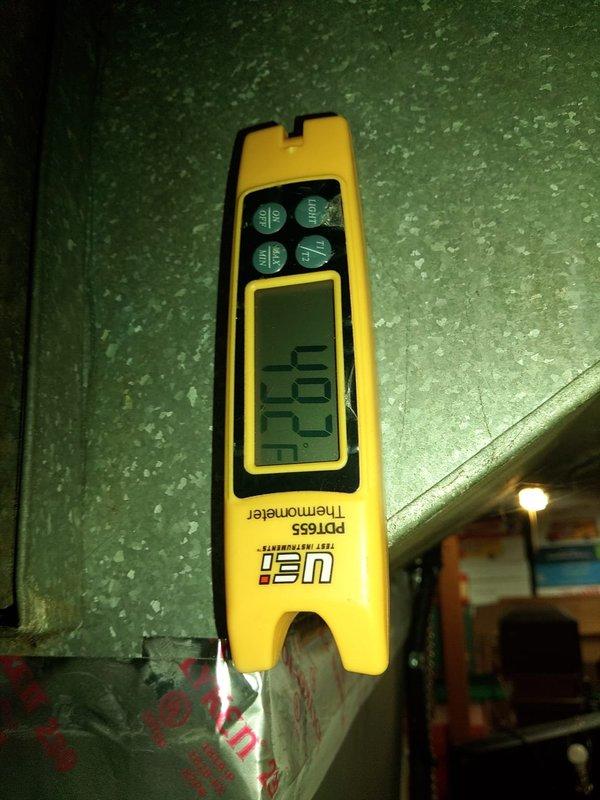 Completed installation of 90% efficiency furnace and air conditioning system. Replaced worn 30-amp fuse assemblies showing significant oxidation and discoloration, ensuring proper electrical protection for the new equipment. Verified system operation with temperature readings confirming proper functionality of both heating and cooling components.