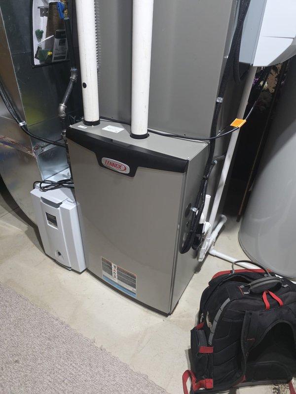 Completed scheduled maintenance visit for MVP customer with 2-year-old residential air conditioning system. Performed comprehensive system inspection of Lennox HVAC equipment, verified proper operation of furnace unit and associated components including PVC venting system, electrical controls, and ductwork connections. All equipment found operating within normal parameters with no issues identified.