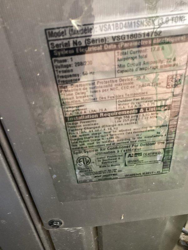 Completed MVP cooling maintenance visit on 7-year-old system. Performed standard inspection of outdoor unit, documenting equipment condition including capacitor, wiring connections, and overall unit specifications. Unit showing age-appropriate wear with accumulated debris and weathering on exterior components; all electrical connections remain intact and functional.
