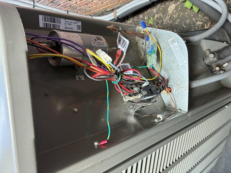Returned to property to complete surge protector installation on outdoor HVAC condensing unit. Installed two surge protectors to electrical system, connecting to existing wiring assembly and capacitor circuit. Verified all electrical connections secure, tested unit operation, and confirmed proper system function upon completion.