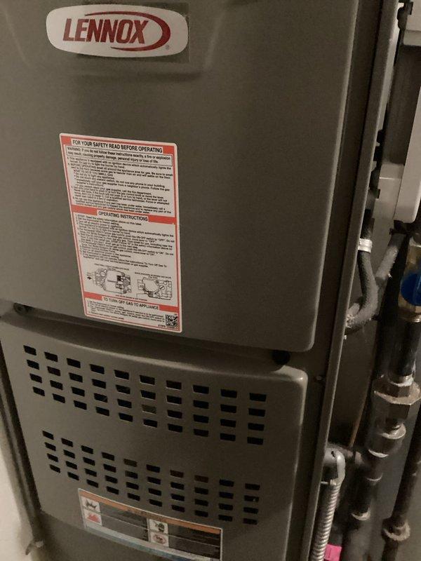 Completed scheduled air conditioning tune-up on 5-year-old Lennox HVAC system. Performed standard maintenance inspection including filter examination, ductwork assessment, and verification of all system components and connections for proper operation. Unit found to be in good working condition with all safety labels and ventilation panels intact.