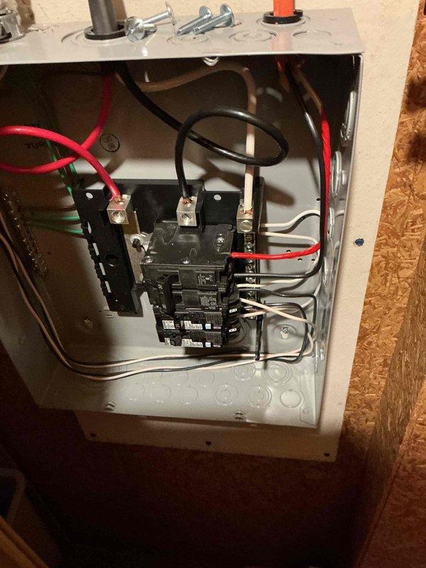 Responded to callback for repeatedly tripping breaker on outlet circuit installed earlier this year. Inspected electrical panel and traced circuit to under-cabinet outlet installation. Identified improper wiring connection at the yellow GFCI device causing intermittent ground fault condition. Corrected wire terminations at device, verified proper grounding to green equipment ground conductor, and confirmed secure connections at panel breaker. Tested circuit under load, reset breaker, and verified stable operation with no further tripping.