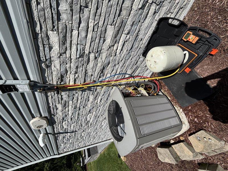 Completed MVP cooling maintenance visit on 9-year-old residential air conditioning system. Performed comprehensive system inspection and diagnostics using digital testing equipment to assess operational performance and refrigerant pressures. Verified proper operation of outdoor condensing unit, checked refrigerant line connections, and confirmed system is functioning within normal parameters. Unit shows appropriate wear for age with no immediate service concerns identified. All testing equipment and safety protocols followed during service call.