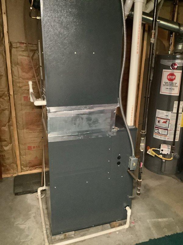 Completed MVP cooling maintenance visit on residential split system with Amana condensing unit and indoor air handler. Performed comprehensive inspection of outdoor unit, verified electrical connections at disconnect box, checked refrigerant lines and condensate drainage system. Inspected indoor air handler in basement mechanical room, confirmed proper operation of all components, and documented equipment condition. System operating within normal parameters with no issues identified.