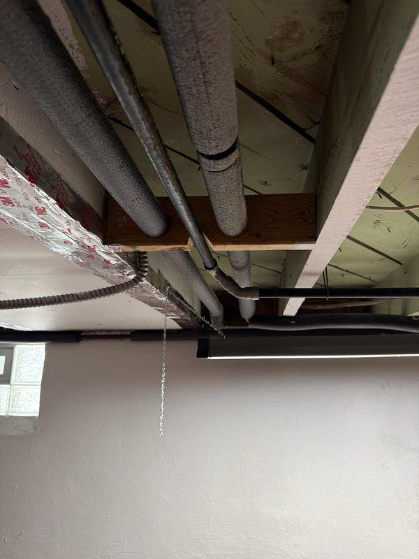 Completed full gas line replacement in basement using black steel piping from the outlet side of the gas meter to supply four fixtures: gas range, water heater, furnace, and gas fireplace. All piping was installed to code specifications and connections were secured at each appliance location. System was pressure tested to verify integrity of all joints and connections throughout the new gas distribution system.