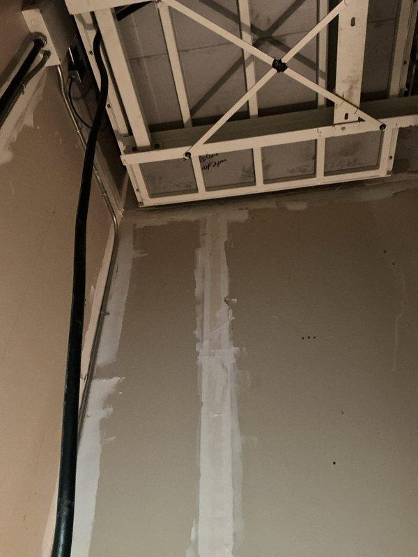 Completed plumbing department matrix repair requiring specialized parts procurement. Technician coordinated part pickup and delivery with estimated next-day arrival. Installation performed in mechanical room area with exposed structural elements and HVAC air handler unit, including proper integration with existing condensate drain lines and utility connections.