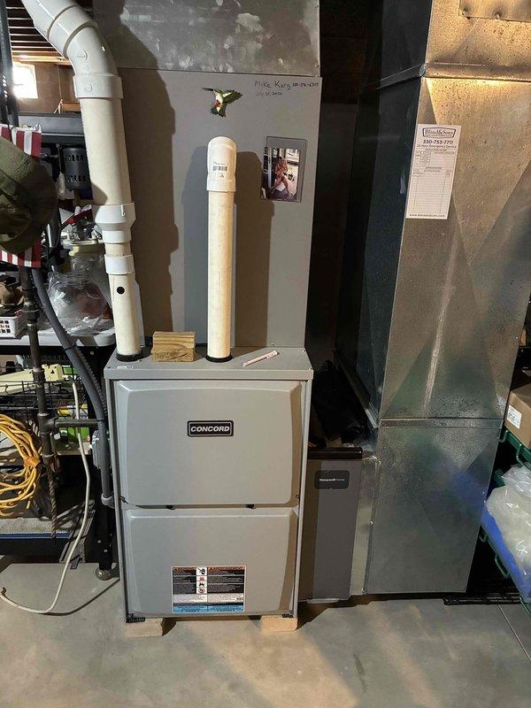 Completed routine maintenance on 5-year-old residential air conditioning system. Performed standard tune-up procedures including inspection of Concord furnace unit and associated air handler, verified proper operation of all components, and checked refrigerant lines and connections for integrity.