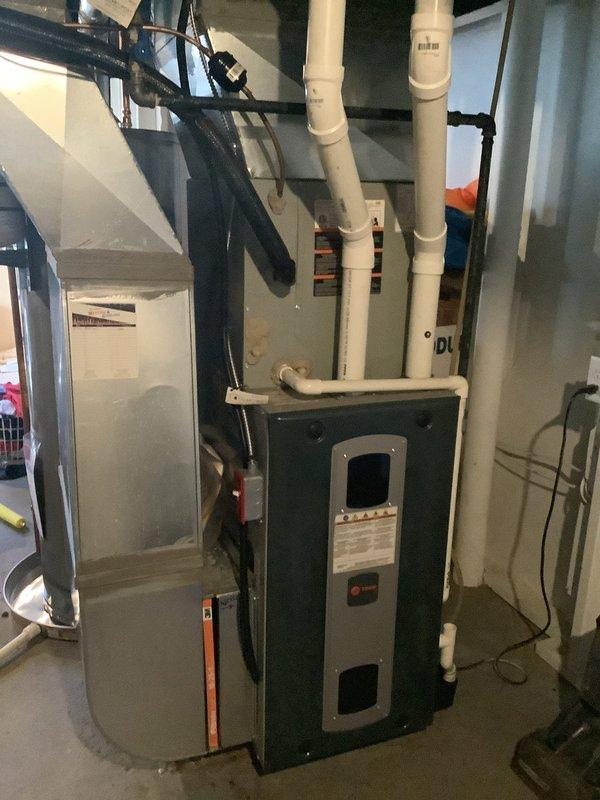 # HVAC Maintenance - Cooling

Completed comprehensive AC tune-up service on residential split system. Performed detailed inspection of indoor furnace unit with integrated cooling coil in basement and outdoor condenser unit, verified all components operating within manufacturer specifications, cleaned condenser coils, checked refrigerant pressures, tested electrical connections, and confirmed proper airflow throughout the system.