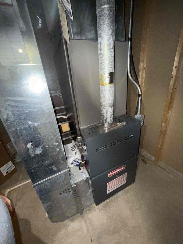 Responded to no-cooling complaint on 5-year-old residential split system with Lennox condenser and Goodman air handler. Upon arrival, confirmed indoor blower motor was not operating, resulting in no airflow through the system. Diagnosed failed blower motor capacitor causing motor failure to start. Replaced defective capacitor with proper OEM replacement, tested blower operation across all fan speeds, and verified proper amp draw. Confirmed condenser unit operating normally with adequate refrigerant charge. System restored to full cooling operation with proper airflow throughout the home.