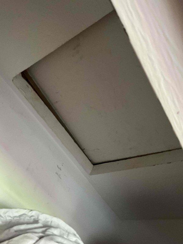 Installed customer-supplied exhaust fan in bathroom, accessing attic space through ceiling hatch to verify and connect to existing electrical wiring. Unit was successfully mounted to ceiling, wired according to manufacturer specifications, and tested for proper operation.