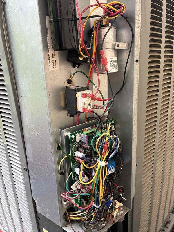 Completed routine maintenance and inspection on Shanklin Platinum outdoor condensing unit. Accessed electrical compartment and verified proper operation of capacitor, contactors, and control board; all wiring connections secure with no signs of overheating or damage. Unit operating within normal parameters with adequate airflow through condenser coils.