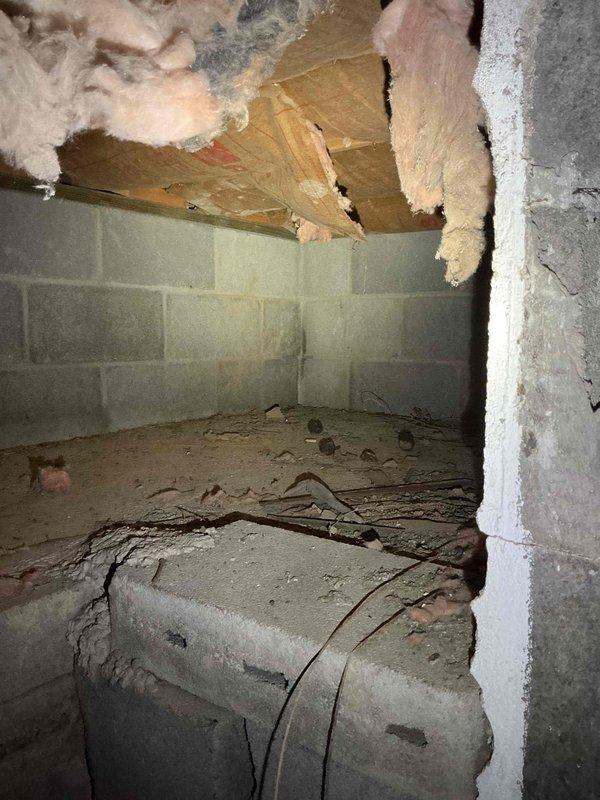 Conducted on-site electrical assessment for backup generator installation at residential property. Customer requires uninterrupted power due to medical oxygen equipment dependency. Performed comprehensive evaluation of existing electrical infrastructure and identified optimal generator placement location. Documented current electrical service capacity, main panel specifications, and available space for transfer switch installation. Photographed basement area showing exposed floor joists, concrete block foundation walls, and existing HVAC ductwork to assess potential routing paths for generator feed lines and natural gas supply. Noted unfinished basement conditions including deteriorated insulation and structural elements that may require consideration during installation planning. Provided customer with financing options information as requested to facilitate project approval and scheduling.