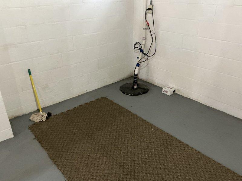 Conducted on-site assessment for whole-home dehumidification system installation in basement utility area. Evaluated existing HVAC infrastructure, drainage capabilities including sump pump system, and optimal equipment placement considering available floor space and proximity to washing machine and flexible ductwork. Documented current conditions and provided estimate for dehumidifier installation to address indoor air quality concerns.
