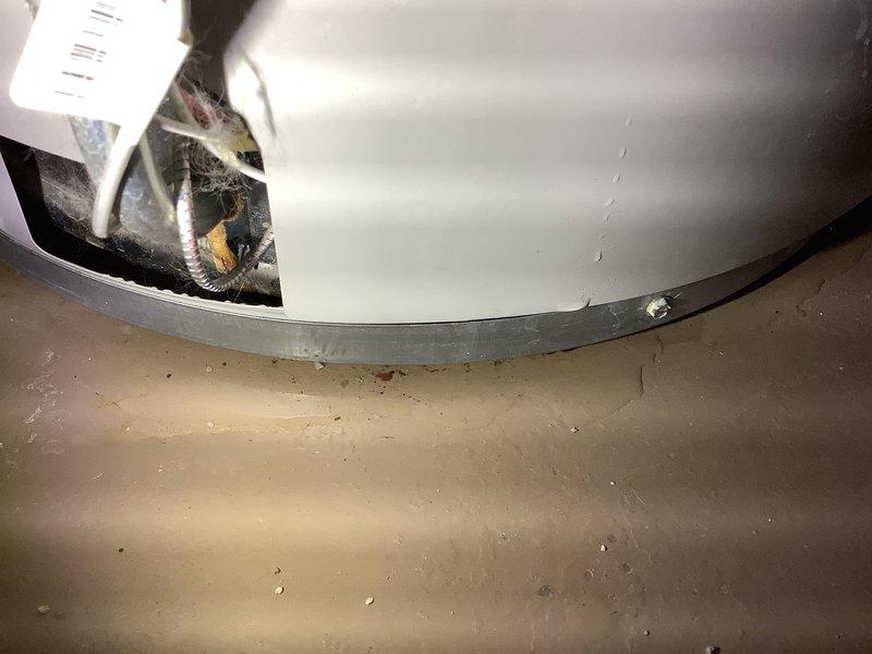 Responded to service call for 13-year-old residential water heater reported to be leaking. Upon arrival, inspected existing tanked water heater unit and confirmed active leak at base of tank, indicating internal tank failure typical of units in this age range. Documented existing installation configuration including copper supply line connections, pressure relief valve placement, and seismic restraint strapping. Customer requested replacement with new unit of comparable capacity, estimated at 40-gallon size based on household needs and existing installation footprint. Photographed existing water heater showing manufacturer labels, energy guide information, plumbing connections, and surrounding mechanical room conditions including brick wall proximity and concrete floor installation area for accurate replacement specifications and permitting requirements.