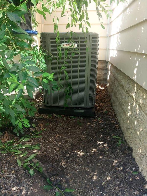 Completed installation of new air conditioning condenser unit and evaporator coil system at residential property. Installed Lennox outdoor condensing unit on composite pad against building exterior with proper clearances maintained. Connected refrigerant lines, performed evacuation procedures, and charged system to manufacturer specifications. Verified system pressures and temperatures using digital manifold gauges, confirming optimal operating parameters across suction and discharge lines. System tested and operational, delivering proper cooling capacity with all readings within normal range.