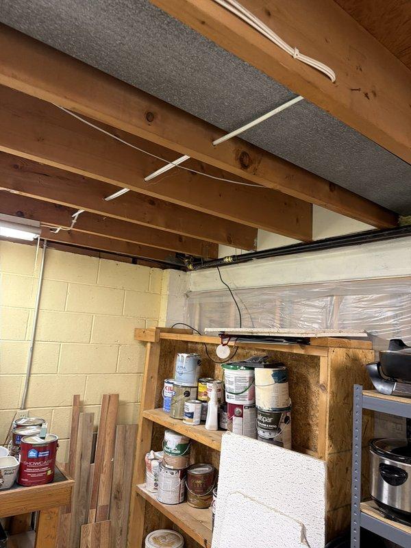 Replaced and rerouted the main gas line in the basement area, tying back into existing lines serving the appliances. New gas piping was properly secured to ceiling joists with appropriate mounting brackets and integrated with the existing gas distribution system. All connections were completed to code specifications and the system was tested for proper operation and safety.