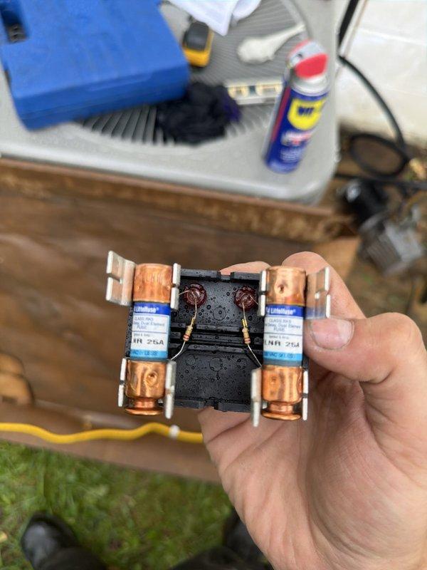 Completed installation of outdoor air conditioning condenser unit and evaporator coil system. Mounted condenser unit on exterior pad against building wall, installed line set with proper insulation running through wall penetration, and connected electrical disconnect box with appropriate wiring and fuse protection. Verified all electrical connections, tested system operation, and confirmed proper refrigerant charge and airflow through new coil assembly.