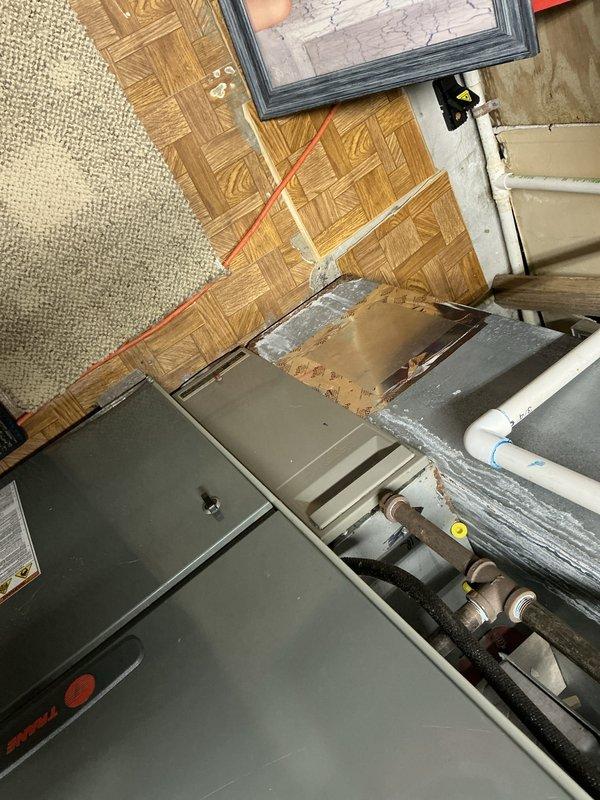 Provided estimate for replacement of 15-year-old basement furnace and air conditioning units. Existing heat exchanger was found to be cracked, necessitating full system replacement for safety and efficiency concerns.