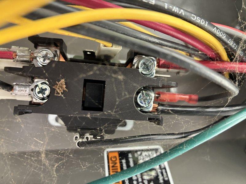 Completed preventive maintenance cooling visit on 4-year-old air conditioning system. Performed standard inspection of electrical connections at outdoor unit, finding terminal block with dust and cobweb accumulation but all wire connections secure with proper torque. Verified service disconnect box operational and properly labeled. Unit operating within normal parameters upon completion of maintenance protocol.