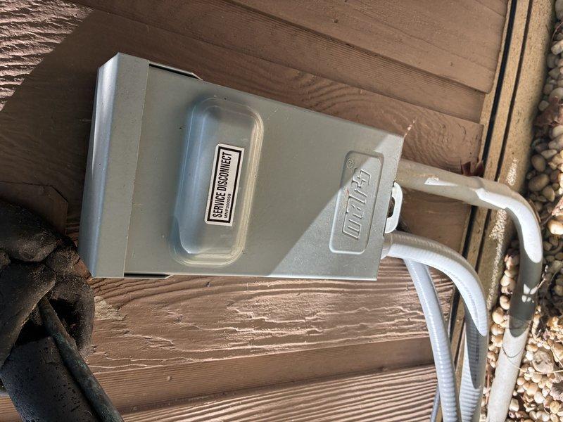 Completed preventive maintenance cooling visit on 4-year-old air conditioning system. Performed standard inspection of electrical connections at outdoor unit, finding terminal block with dust and cobweb accumulation but all wire connections secure with proper torque. Verified service disconnect box operational and properly labeled. Unit operating within normal parameters upon completion of maintenance protocol.