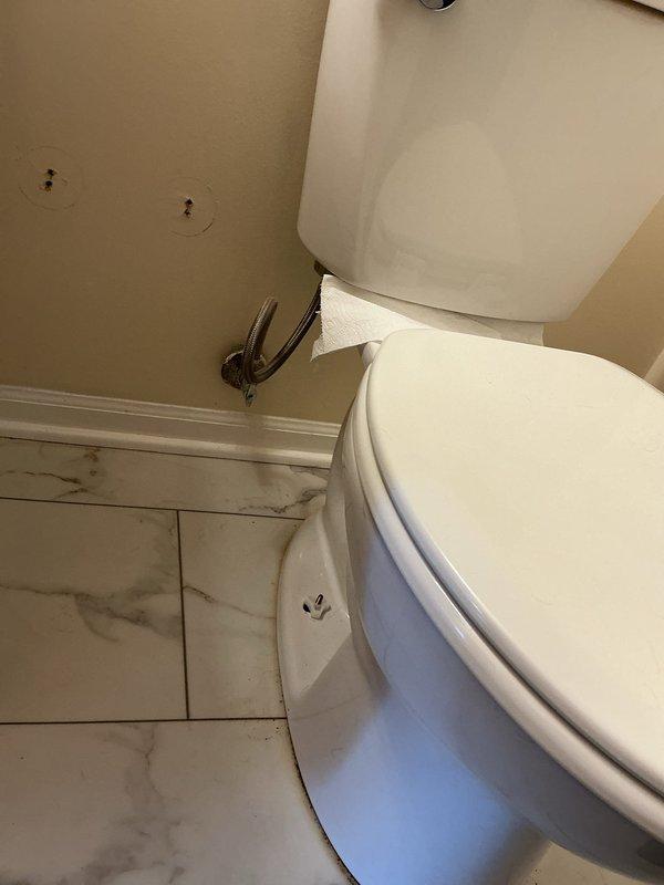 Responded to service call for toilet leaking around base, which had been previously installed. Upon inspection, found evidence of water staining on tile flooring and grout lines surrounding toilet base, indicating ongoing leak. Removed toilet to access wax ring and flange connection. Discovered compromised wax ring seal causing water to escape during flushing. Cleaned flange area, scraped old wax residue, and inspected flange bolts and mounting hardware for proper condition. Installed new wax ring with polyethylene flange, ensuring proper compression and seal. Reset toilet, tightened closet bolts to manufacturer specifications, and reconnected water supply line. Tested flush mechanism multiple times to verify proper seal and confirm no leakage at base. Cleaned work area and advised homeowner to monitor for any further moisture issues.