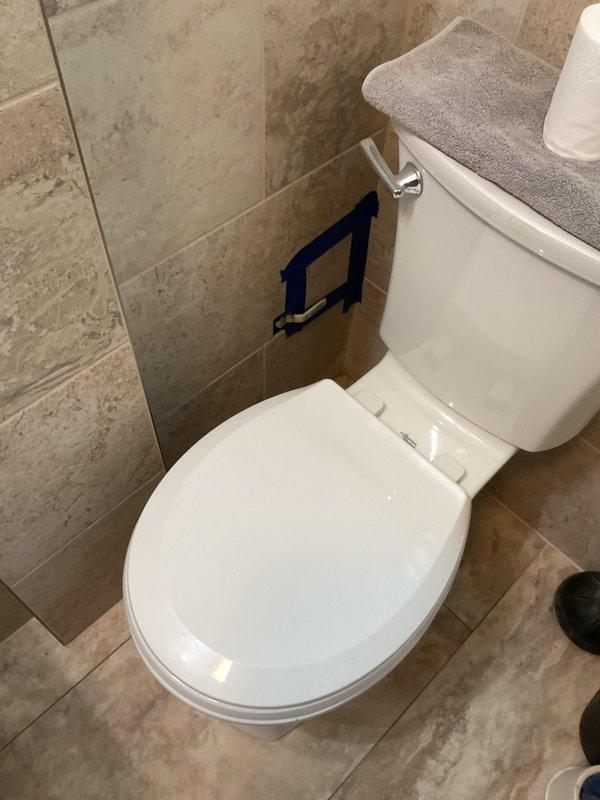 Responded to failed frost-free sillcock requiring replacement. Removed section of bathroom tile to access the failed outdoor hose connection fixture. Replaced the frost-free sillcock with new unit and reinstalled tile section to restore wall integrity. Verified proper operation and confirmed hose connection functionality upon completion.