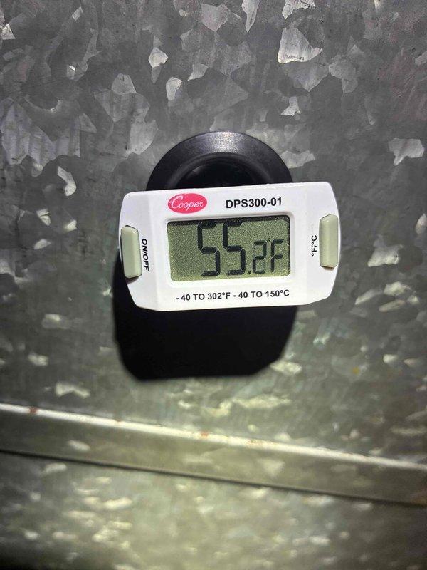 Performed routine maintenance on a three to four year old air conditioning system. Inspected electrical components including capacitors and wiring connections within the control compartment, verified all connections were secure and properly terminated. Measured supply air temperature at 55.2°F, confirming adequate cooling performance and proper system operation.