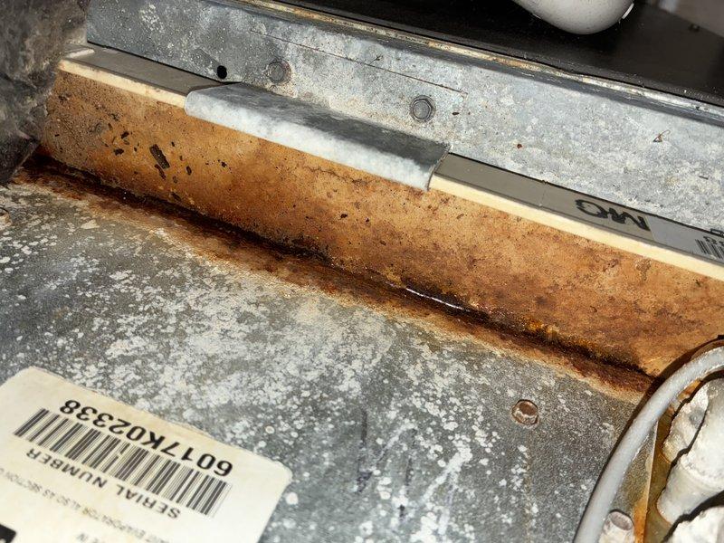 # HVAC Maintenance - Cooling

Completed routine MVP cooling maintenance visit on an 8-year-old system. Performed comprehensive inspection of control board and electronic components, verifying proper operation of all circuits, connections, and wire harnesses. Documented significant rust and corrosion staining along the unit's base threshold area, indicating previous moisture intrusion or condensation issues that will require monitoring during future service visits.