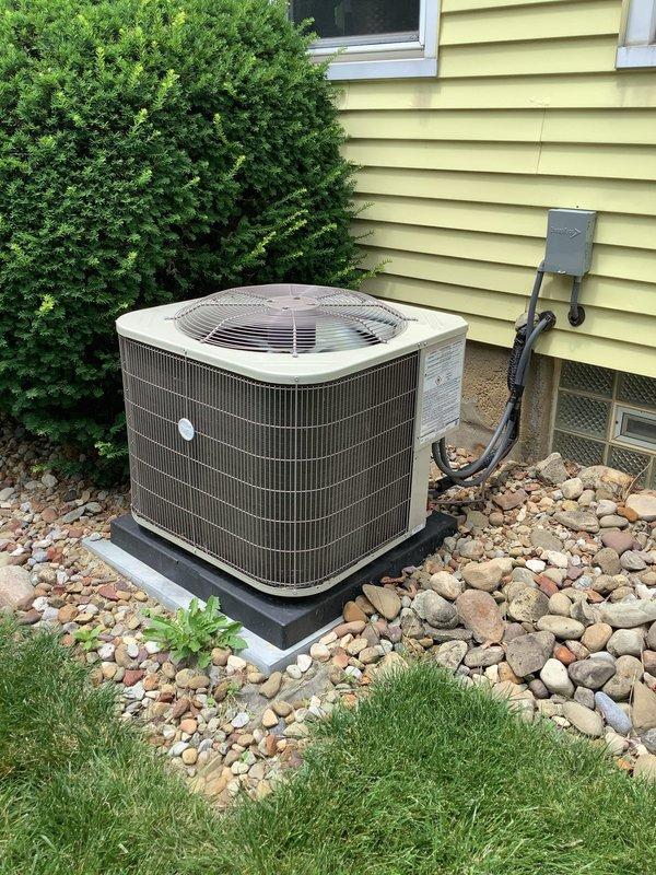 Completed MVP Cooling Visit for residential HVAC system. Performed comprehensive inspection of Trane furnace unit in basement and outdoor condenser unit, verifying proper operation of all components. Documented system conditions through photographic records showing indoor air handler with connected PVC drainage lines, flexible conduit, and filter cabinet, as well as exterior condenser unit positioned on concrete pad with proper clearances and landscaping. All equipment found operating within normal parameters with no immediate service needs identified during this recurring maintenance visit.