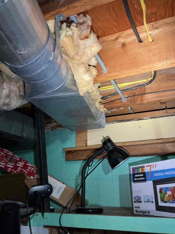 Conducted on-site electrical assessment for whole-house generator installation at residential property. Evaluated existing electrical infrastructure in basement utility area, documenting current panel location, available conduit pathways, and clearance requirements for transfer switch installation. Inspected exterior mounting location adjacent to gas meter on brick foundation wall, confirmed adequate clearances from structure and utilities, and verified accessibility for fuel line connection and service access. Photographed proposed generator pad location, existing electrical service entry point, and basement routing options for load center interconnection to provide comprehensive documentation for permit application and installation planning.