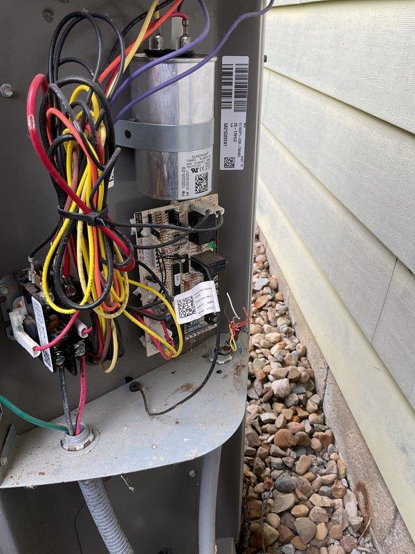 Responded to urgent no heat or air call and diagnosed failed heat pump defrost control board. Ordered replacement defrost board for shop delivery and returned upon parts arrival to complete installation. Removed faulty defrost control board from outdoor unit electrical compartment, installed new board, reconnected all wiring to proper terminals, and verified system operation. Unit restored to normal heating and cooling function with defrost cycle operating correctly.