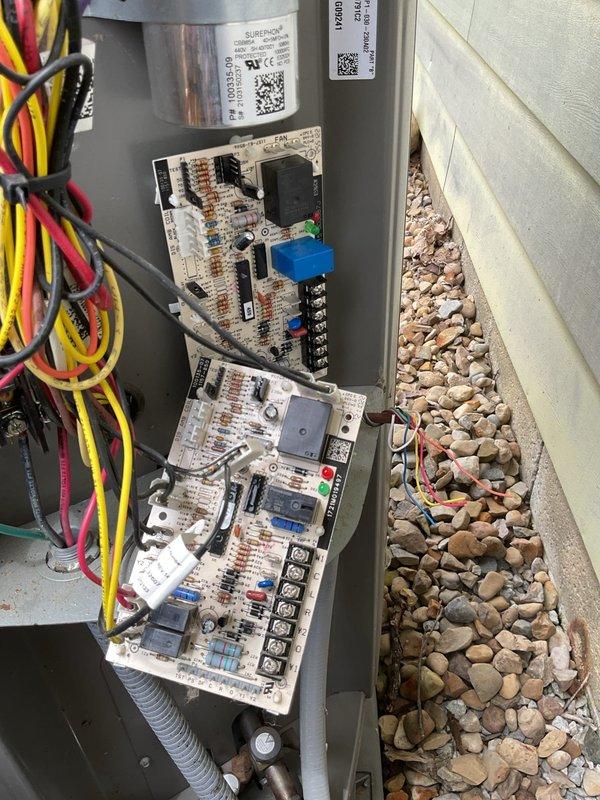 Responded to urgent no heat or air call and diagnosed failed heat pump defrost control board. Ordered replacement defrost board for shop delivery and returned upon parts arrival to complete installation. Removed faulty defrost control board from outdoor unit electrical compartment, installed new board, reconnected all wiring to proper terminals, and verified system operation. Unit restored to normal heating and cooling function with defrost cycle operating correctly.