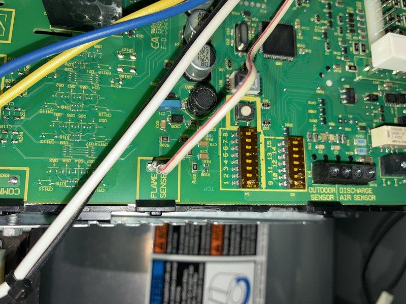 Completed warranty installation requiring replacement of control board assembly and wiring harness (part #94W02). Installed new printed circuit boards with integrated flame sense, outdoor sensor, and discharge air sensor connections. Replaced associated wire harnesses and verified all sensor inputs, capacitors, and control circuits functioning properly. System tested and operational upon completion.