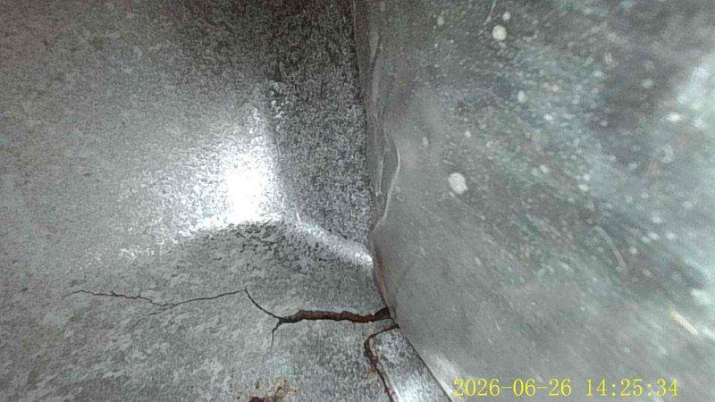 Responded to no cooling complaint on aging air conditioning system. Upon inspection, found failed dual run capacitor with visible deterioration and corrosion on contactor assembly. Replaced capacitor, cleaned electrical connections, and verified proper amperage draw on compressor and condenser fan motor. System restored to normal cooling operation with all components operating within manufacturer specifications.