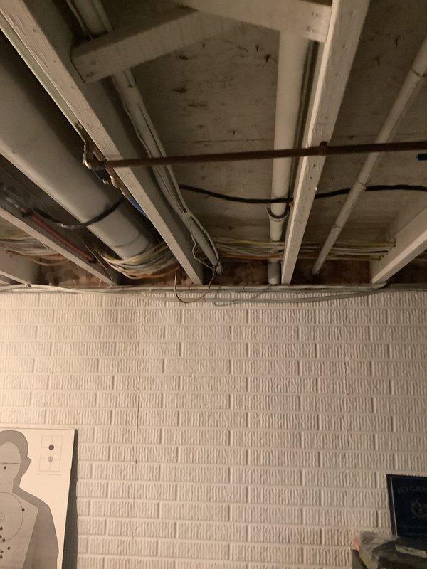 Conducted comprehensive HVAC system assessment for replacement estimate in residential basement mechanical room. Evaluated existing Concord brand furnace installation, associated electrical infrastructure, ductwork configuration, and utility connections including PVC venting and copper plumbing lines. Documented current equipment condition, spatial layout, and structural considerations for proposed system replacement through VA approval process.