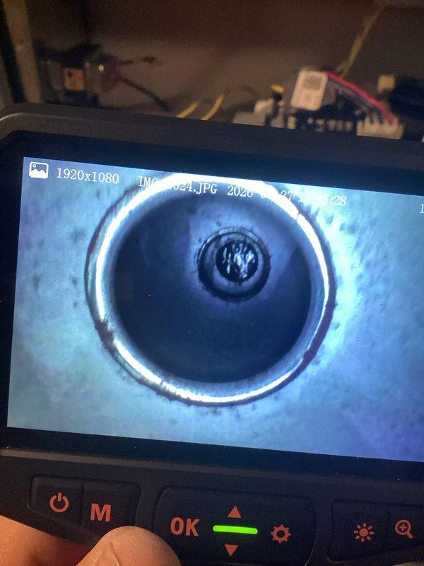 Completed scheduled MVP air conditioning maintenance service. Performed comprehensive system inspection including blower wheel examination and internal component assessment using borescope camera to verify proper condition of evaporator coil and interior surfaces. All components found operating within normal parameters with typical dust accumulation noted on blower assembly.