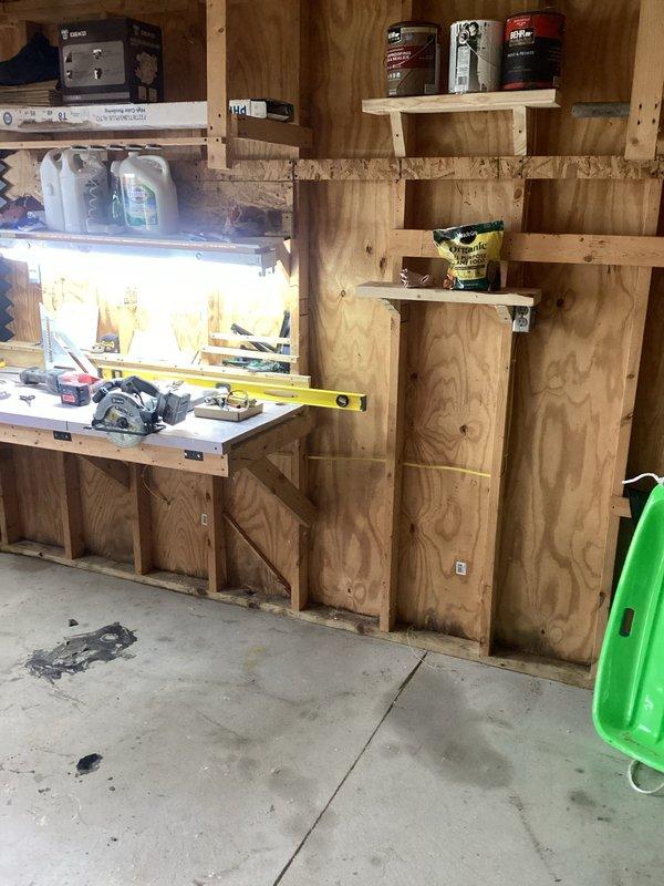 Installed new electrical outlet on bar area inside barn structure by tapping into existing outlet circuit. Ran appropriate gauge wiring from source outlet to new location, ensuring proper connection and secure mounting of outlet box on wooden wall surface. Verified circuit functionality and tested new outlet for proper voltage and grounding. Work required coordination of parts procurement prior to installation completion.