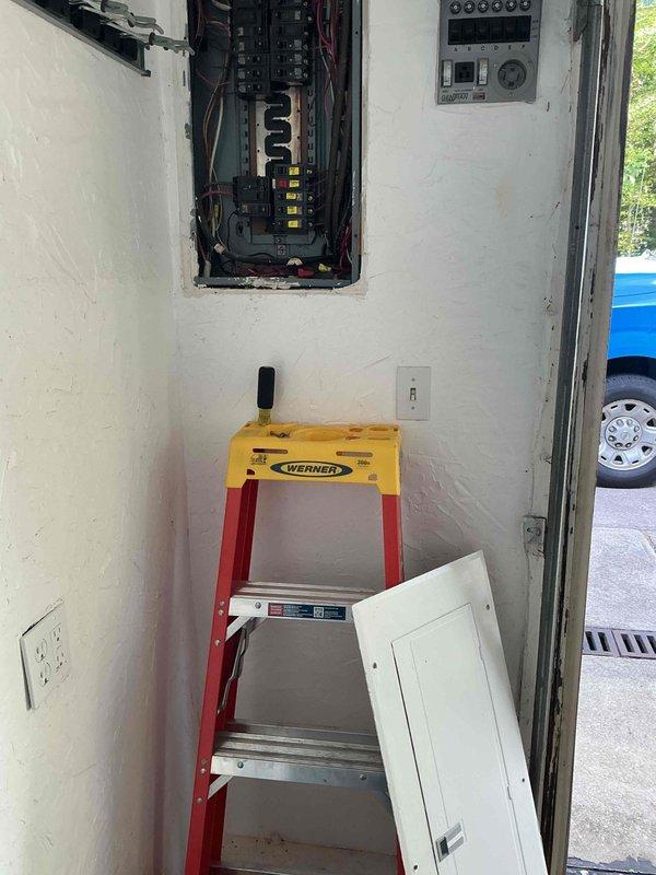Conducted comprehensive electrical assessment for residential panel replacement and generator transfer switch installation. Evaluated existing electrical infrastructure in basement area, documenting current panel configuration with exposed circuit breakers and wiring conditions. Provided detailed second opinion estimate for complete electrical panel upgrade and transfer switch integration to support backup generator system for new homeowner.
