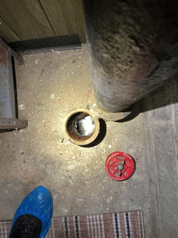 Responded to mainline backup issue and performed drain cleanout service. Upon arrival, located floor drain in basement utility area with visible standing water and drainage concerns. Cleared main drain line obstruction, restoring proper flow and drainage function. Tested system to confirm blockage was removed and drainage was operating normally.