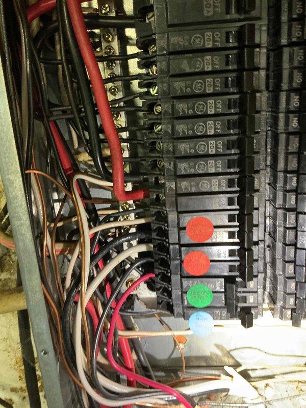 Conducted electrical assessment for generator installation at residential property. Evaluated existing electrical panel and service capacity to determine compatibility and requirements for standby generator system. Documented current panel configuration, circuit breaker arrangement, and existing wiring conditions. Noted aging infrastructure including deteriorated cloth-wrapped wiring and signs of moisture infiltration in utility area. Identified necessary electrical upgrades and transfer switch placement requirements. Photographed electrical panel interior and surrounding mechanical space to support estimate preparation. Also assessed potential water heater replacement needs during site visit.