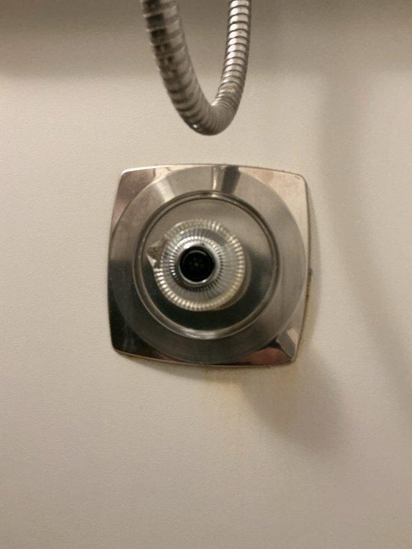 Responded to service call for leaking shower head. Upon inspection, disassembled chrome shower fixture and replaced worn internal washer causing the leak. Tested water flow and verified no further dripping from shower head assembly. System restored to proper working condition.
